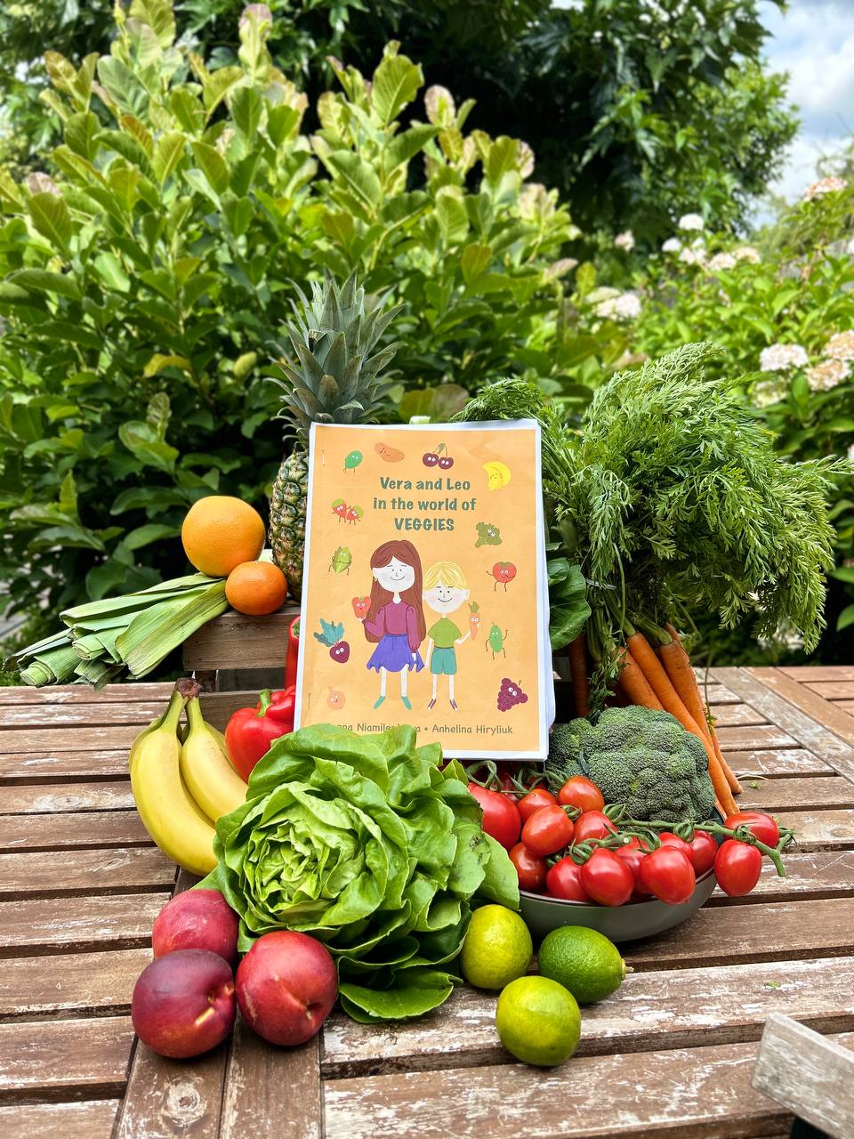 children's book and colorful vegetables