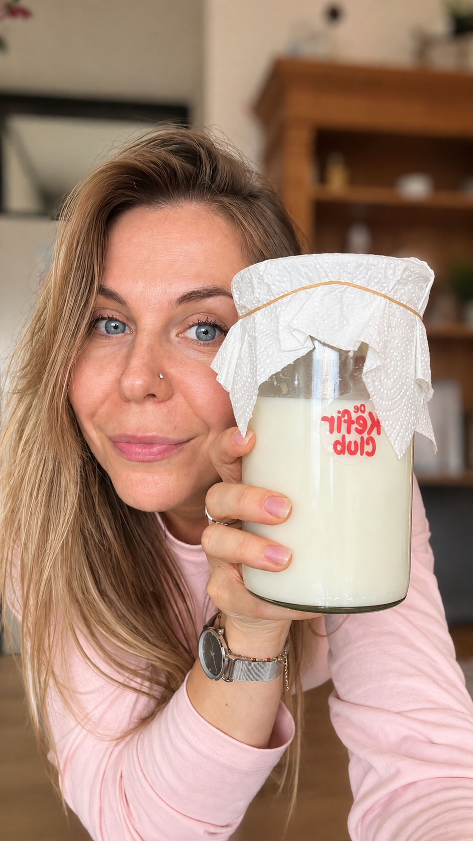 woman kefir in glas jar 